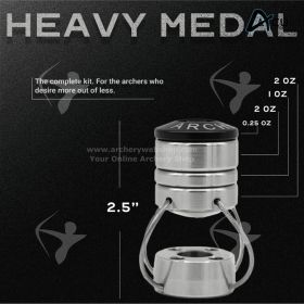 Studio image of the S.O.S. Heavy Medal with weight inserts installed, photographed from an angled perspective. The compact profile and stainless steel construction are emphasized through lighting and shadow. The wire system appears centered and aligned, r